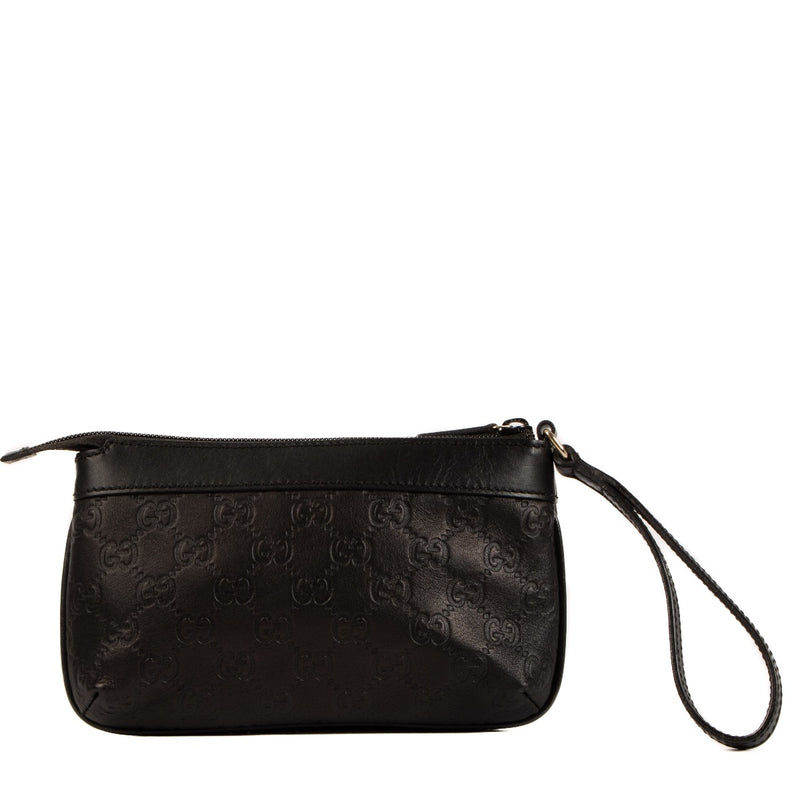 Shop safe online at Labellov this 100% authentic second hand Gucci Black Monogram Empreinte Clutch