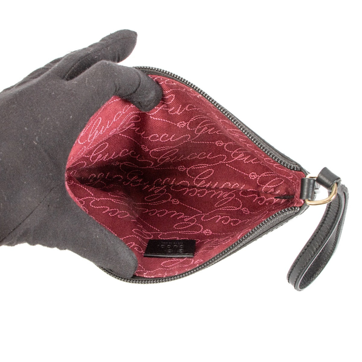 Shop safe online at Labellov this 100% authentic second hand Gucci Black Monogram Empreinte Clutch