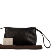 Shop safe online at Labellov this 100% authentic second hand Gucci Black Monogram Empreinte Clutch