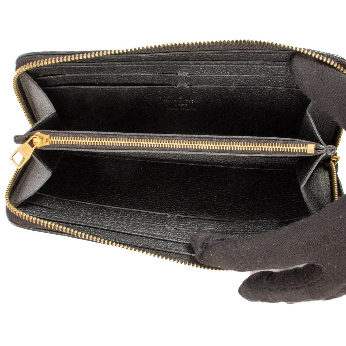 Shop safe online at Labellov this 100% authentic second hand Louis Vuitton Black Monogram Empreinte Leather Clémence Wallet