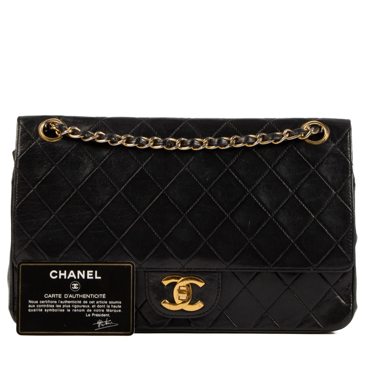shop 100% authentic second hand Chanel Black Lambskin Quilted Classic Flap Bag on Labellov.com