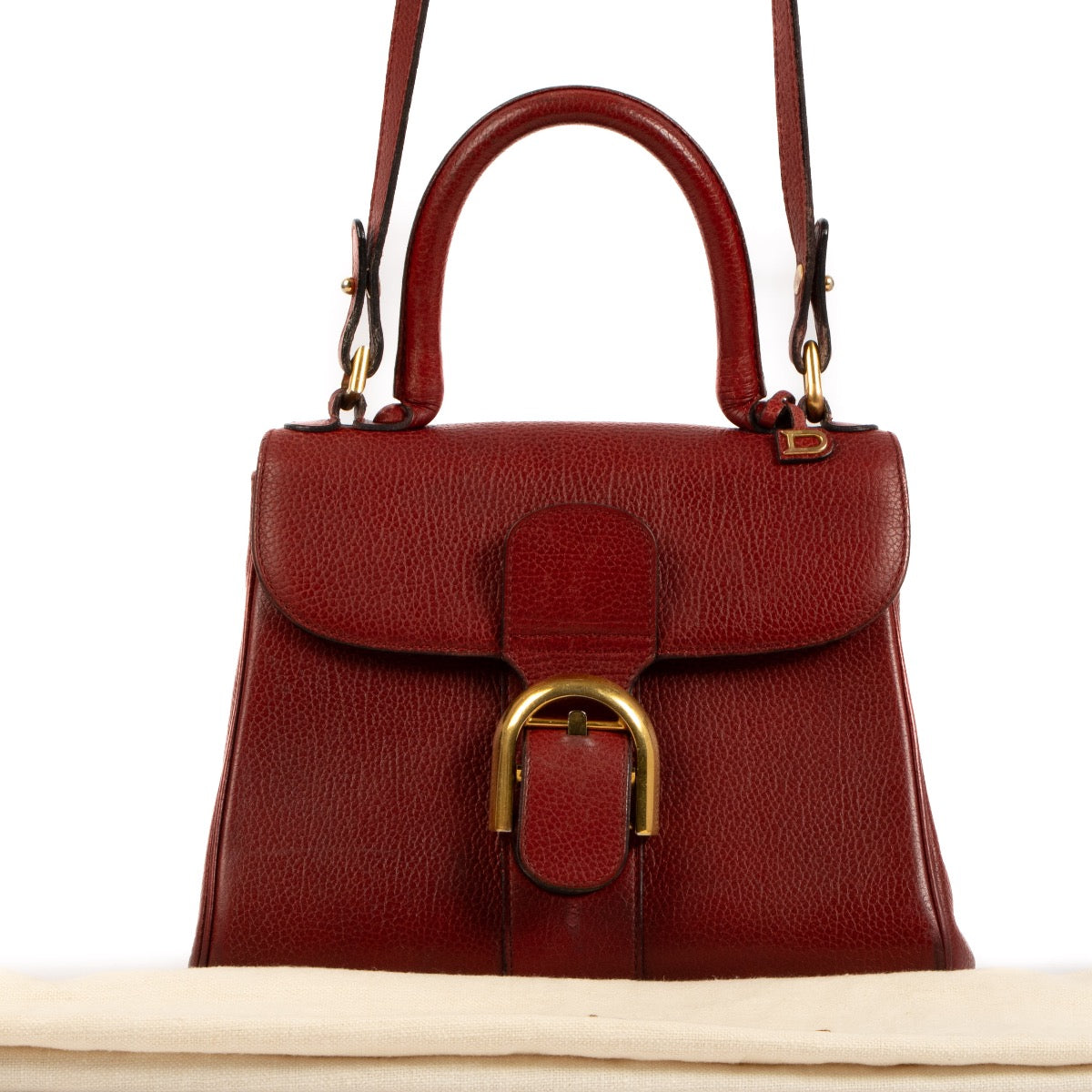 Shop safe online at Labellov in Antwerp, Brussels and Knokke this 100% authentic second hand Delvaux Rosso PM Brillant Top Handle