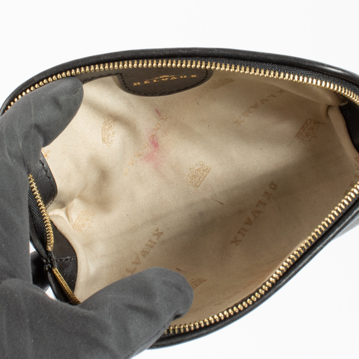 Shop safe online at Labellov this 100% authentic second hand Delvaux Black Leather Pouch
