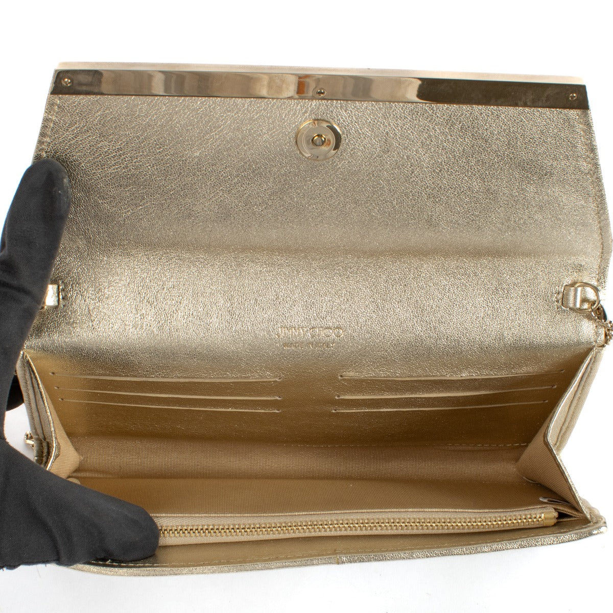 Shop safe online at Labellov in Antwerp, Brussels and Knokke this 100% authentic second hand Jimmy Choo Gold Sparkle Margot Clutch Bag