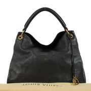 Shop safe online at Labellov in Antwerp, brussels and Knokke this 100% authentic second hand Louis Vuitton Black Monogram Empreinte Artsy MM Bag