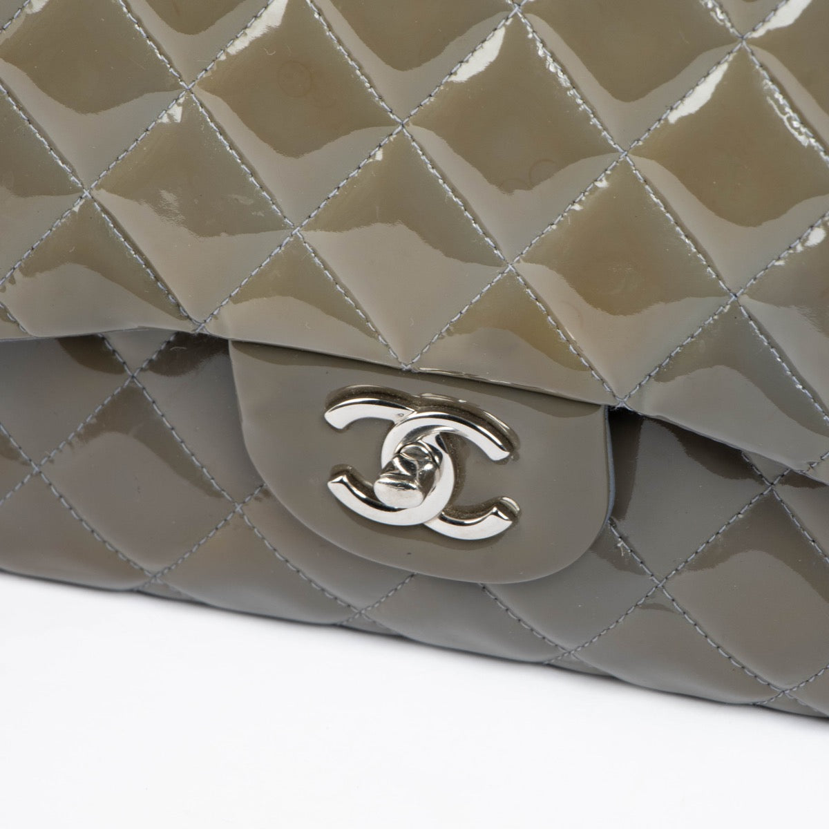Authentic pre-loved Chanel Khaki Patent Classic Large Flap Bag on Labellov.com