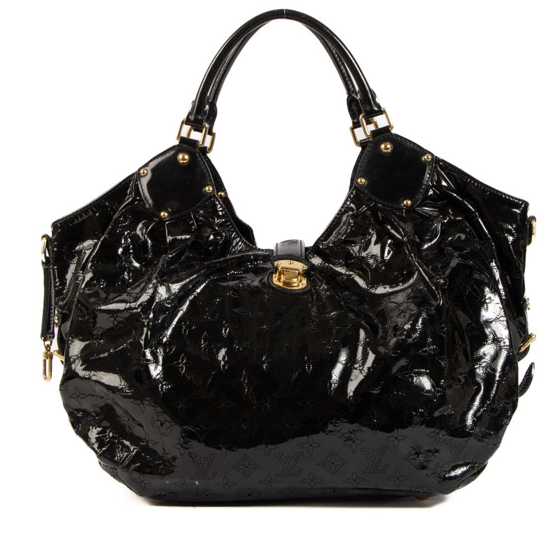 Shop 100% authentic second-hand The Louis Vuitton Black Mahina Surya XL Hobo Bag on Labellov.com