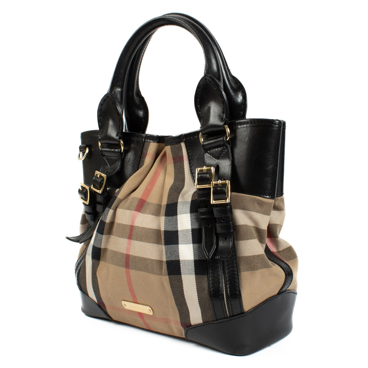 The Burberry Kent bag features the iconic House Check pattern, paired with elegant bridle straps for a touch of British sophistication. This versatile handbag can easily complement both casual and formal outfits. It comes with a dust bag for protection. S