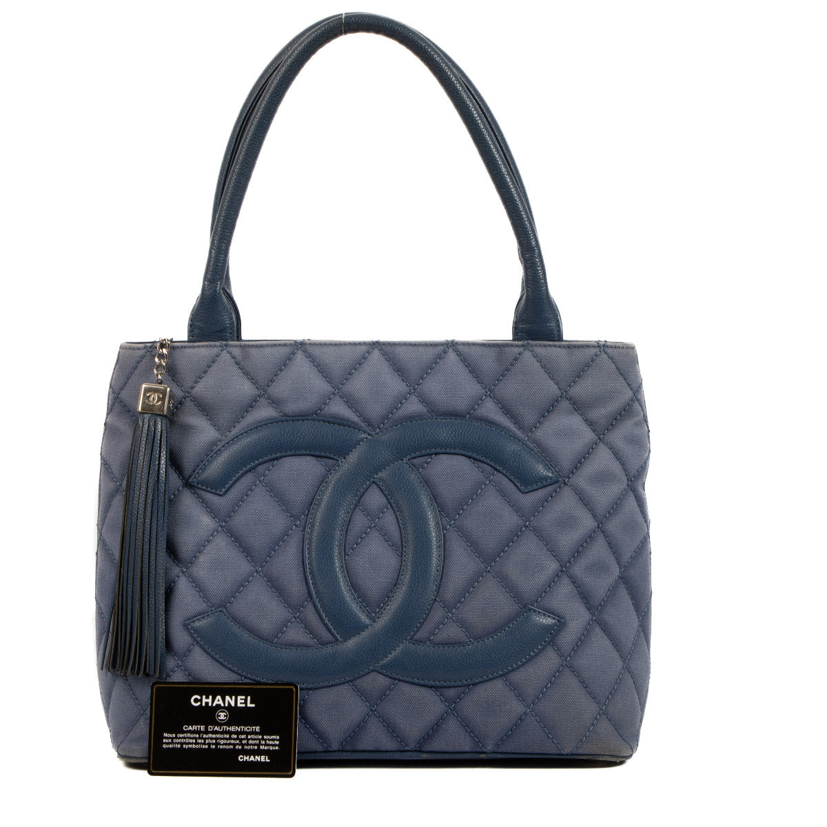 Chanel Blue Quilted Canvas Medallion Tote Bag for the best price at Labellov secondhand luxury in Antwerp. Are you looking for an authentic designer bag for the best price at Labellov.