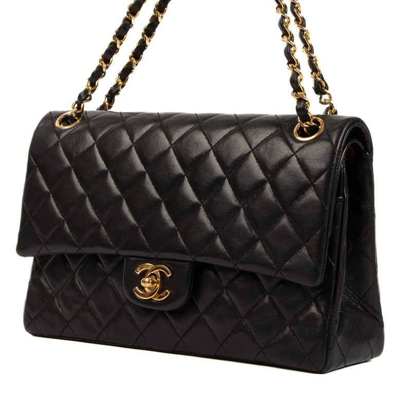 Buy real authentic Chanel Vintage Black Lambskin Medium Classic Flap Bag safe online at Labellov.com or in Brussels, Knokke and Antwerp