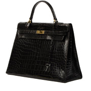 Authentic second hand pre-owned Hermès 1960s-1970s Kelly 35 Black Shiny Porosus Crocodile on labellov.com