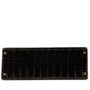 Authentic second hand pre-owned Hermès 1960s-1970s Kelly 35 Black Shiny Porosus Crocodile on labellov.com
