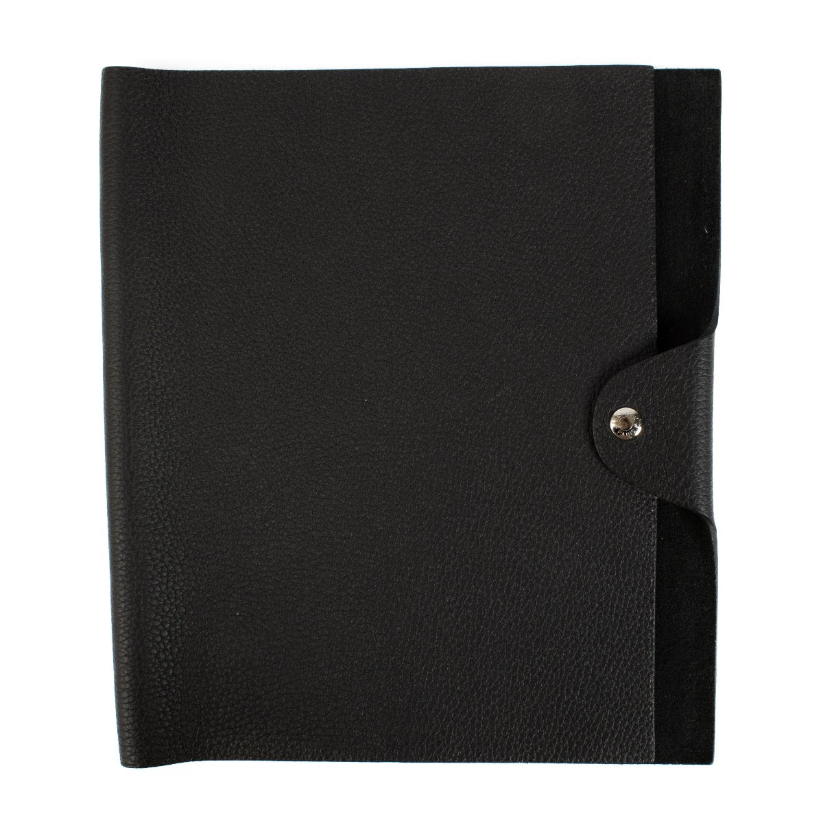 The Hermès Ulysse is a sleek leather notebook holder with a minimalist design, featuring luxurious craftsmanship and a spacious interior for essentials.
