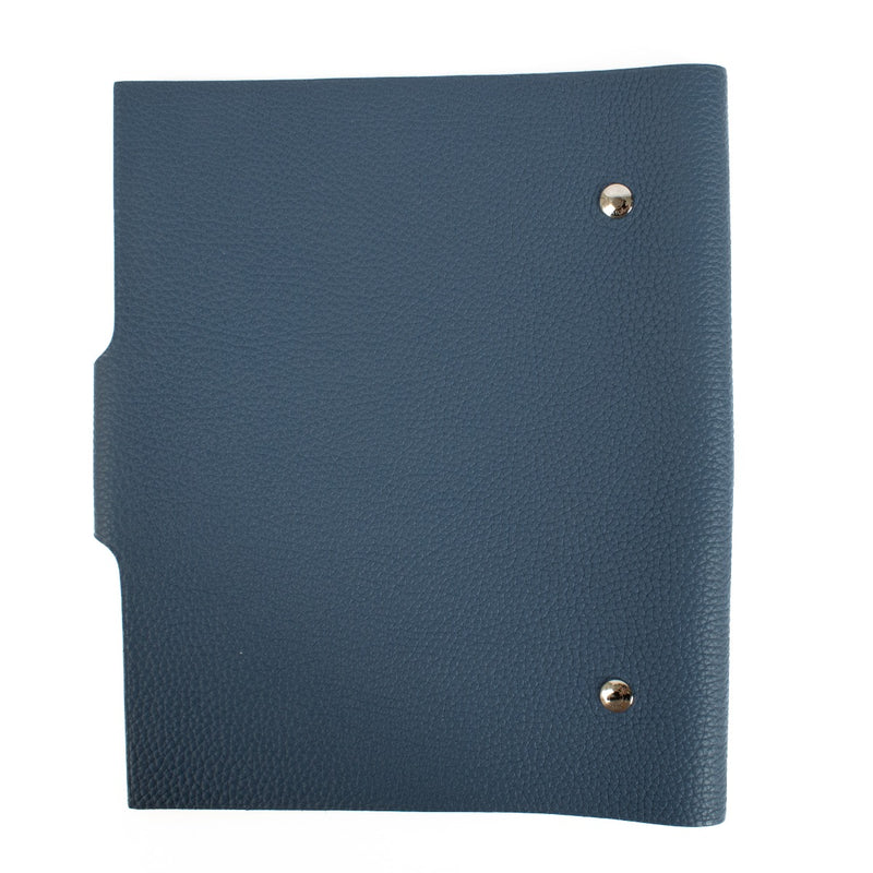 The Hermès Ulysse is a sleek leather notebook holder with a minimalist design, featuring luxurious craftsmanship and a spacious interior for essentials. Shop now on Labellov.com.