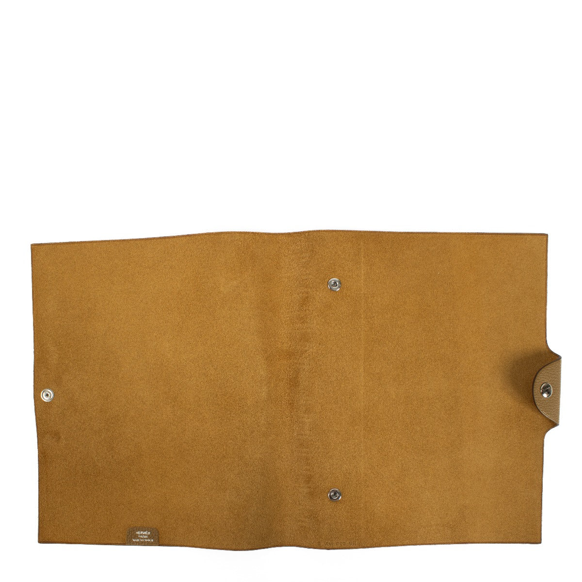The Hermès Ulysse is a sleek leather notebook holder with a minimalist design, featuring luxurious craftsmanship and a spacious interior for essentials.Shop now on Labellov.com.