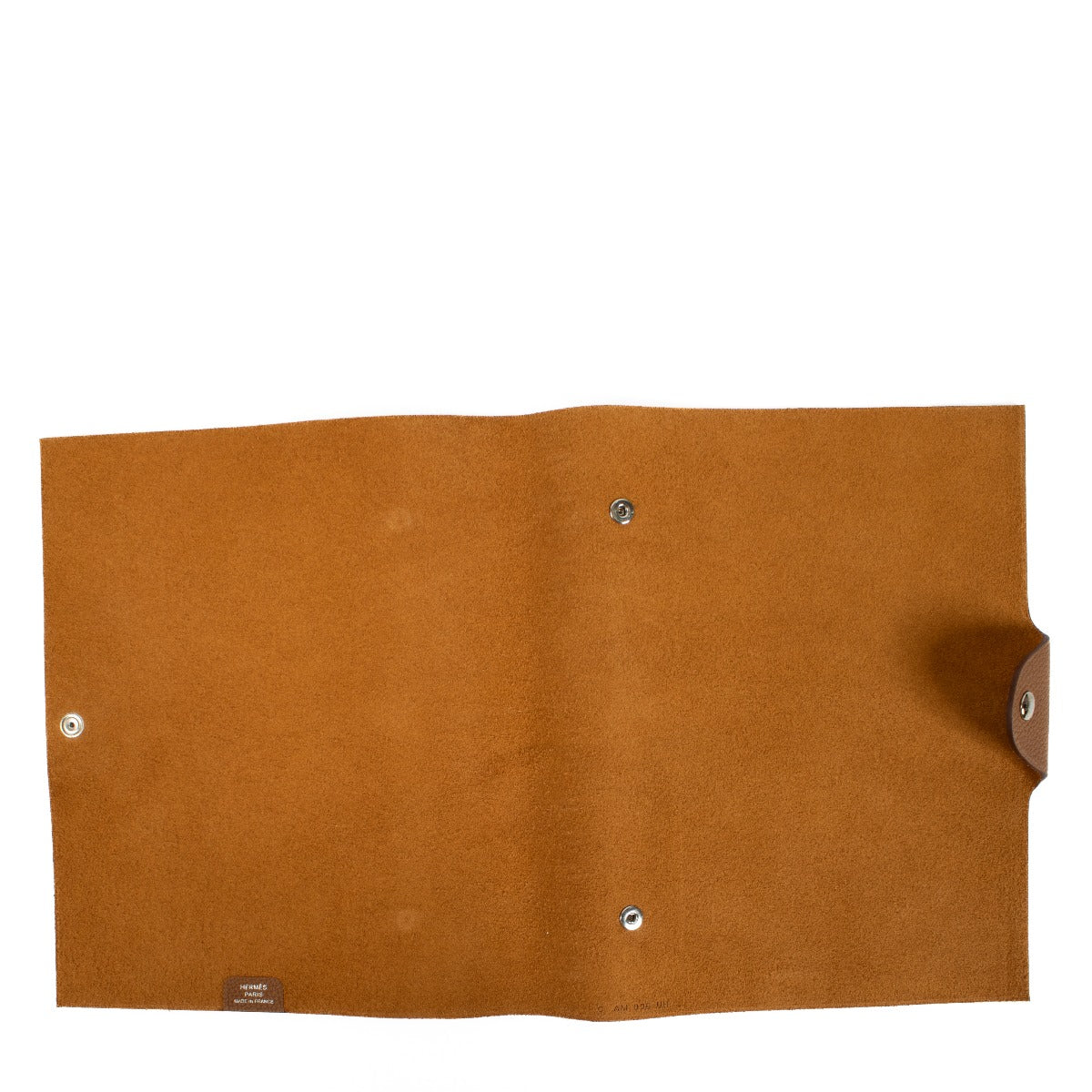 The Hermès Ulysse is a sleek leather notebook holder with a minimalist design, featuring luxurious craftsmanship and a spacious interior for essentials. Shop now on Labellov.com.