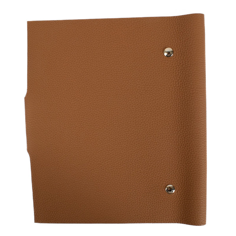 The Hermès Ulysse is a sleek leather notebook holder with a minimalist design, featuring luxurious craftsmanship and a spacious interior for essentials. Shop now on Labellov.com.
