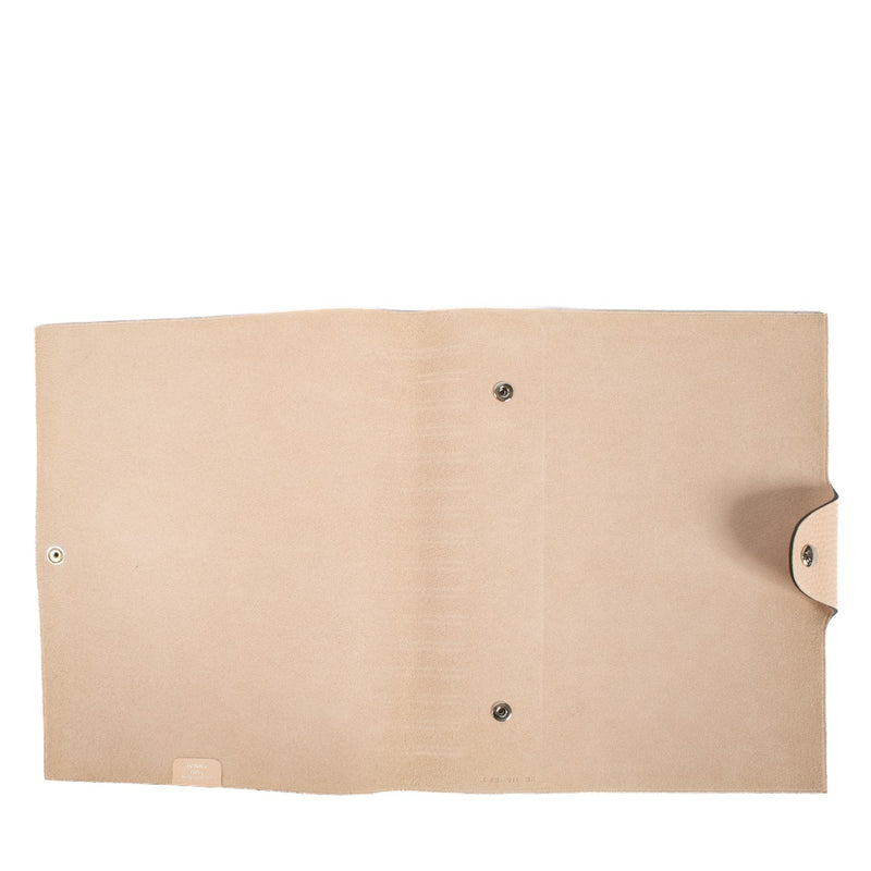 The Hermès Ulysse is a sleek leather notebook holder with a minimalist design, featuring luxurious craftsmanship and a spacious interior for essentials. Shop now at Labellov.com.