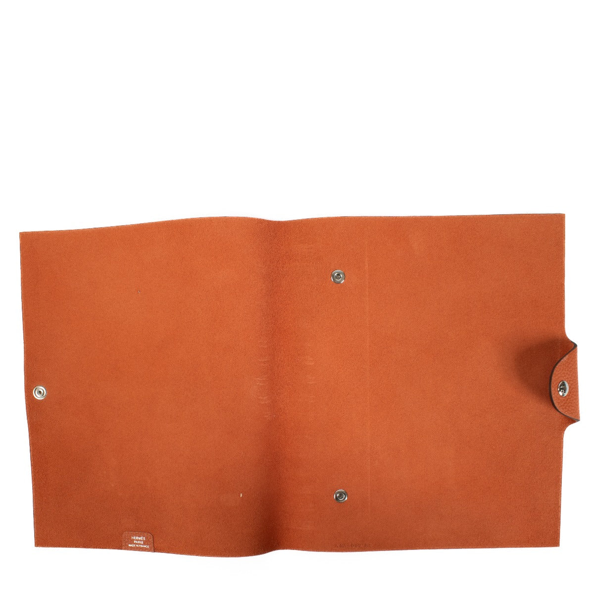 The Hermès Ulysse is a sleek leather notebook holder with a minimalist design, featuring luxurious craftsmanship and a spacious interior for essentials. Shop now on Labellov.com.