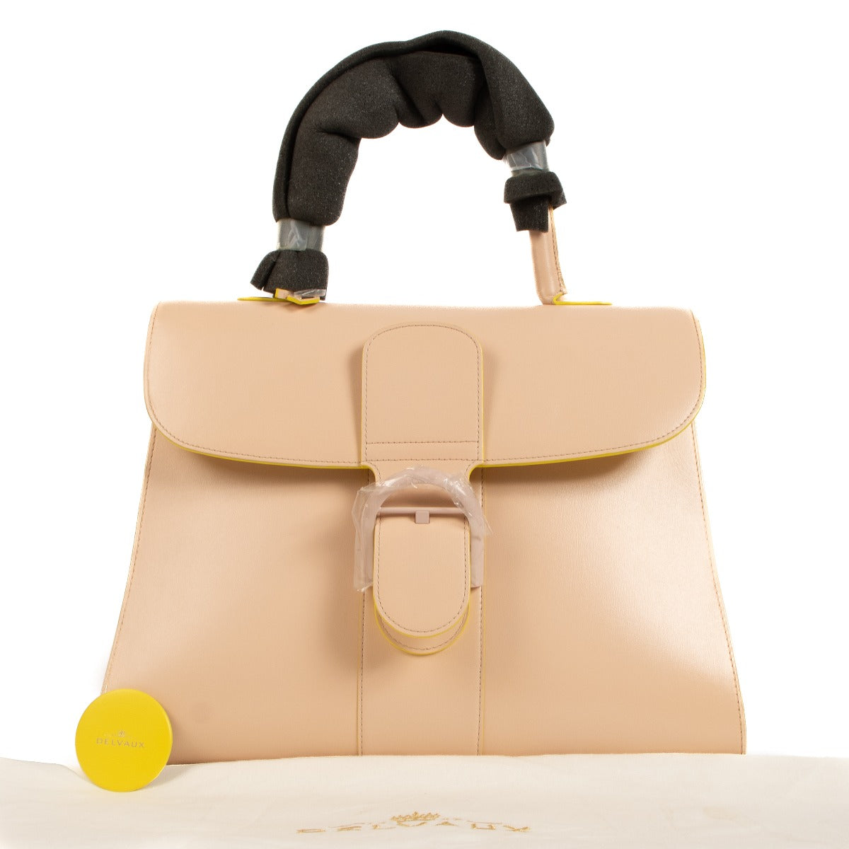 Buy an authentic second hand Delvaux Lilas/Ivory Box Calf Brillant GM Biface in new condition at Labellov.