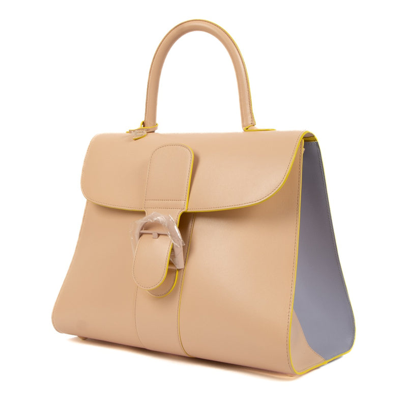 Buy an authentic second hand Delvaux Lilas/Ivory Box Calf Brillant GM Biface in new condition at Labellov.