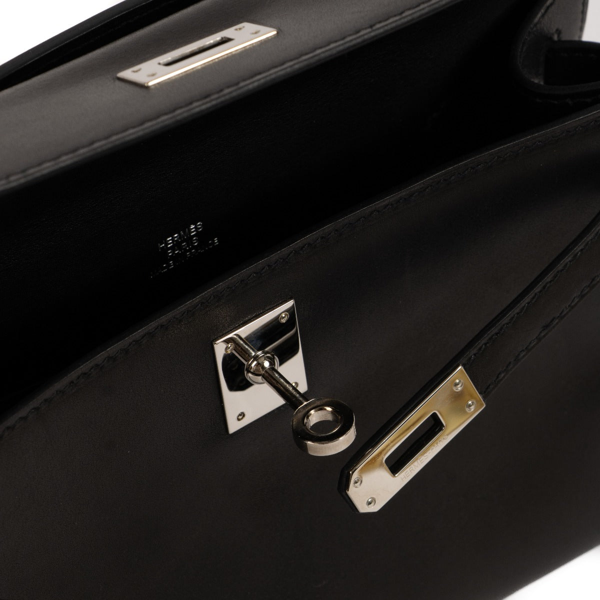 Hermès Kelly Mini Pochette Zwart Swift PHW