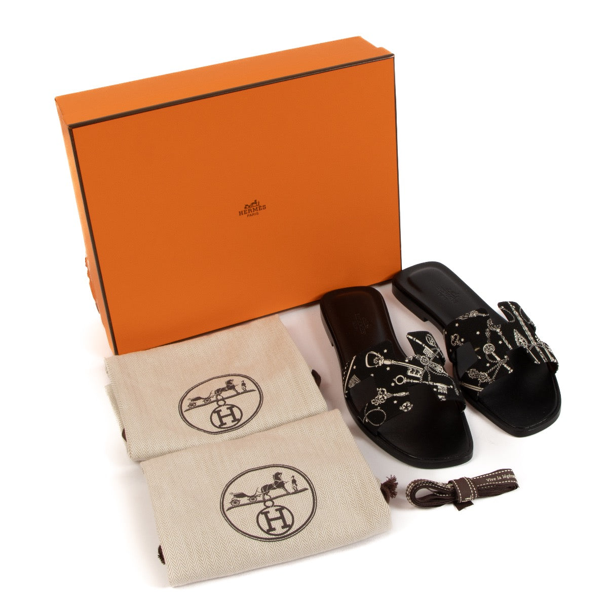 buy real authentic Hermès Black Oran Sandal safe online at Labellov.com or in Brussels, Knokke and Antwerp