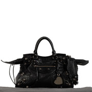 Balenciaga Black Neo Cagole City Bag for the best price at Labellov secondhand luxury in Antwerp, Knokke, Brussels and with worldwide shipping. Buy and sell your preloved and brand new designer bags for the best price online.