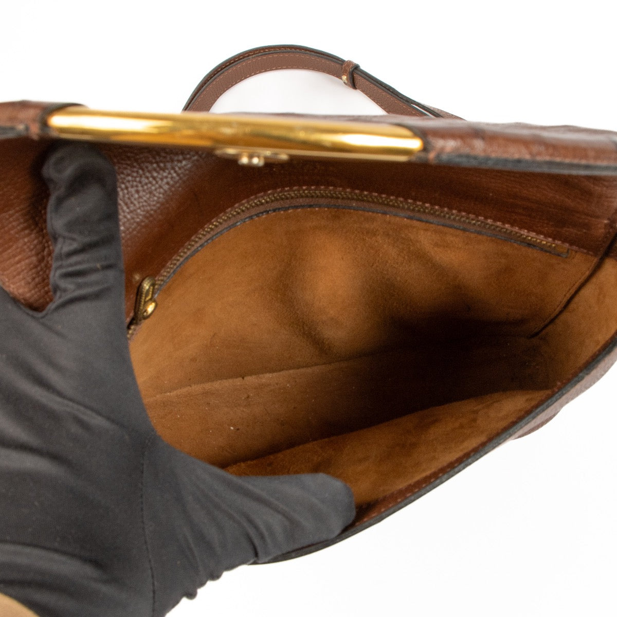 Shop safe online at Labellov in Antwerp, Brussels and Knokke this 100% authentic second hand Delvaux Brown Ostrich Eclair Crossbody Bag