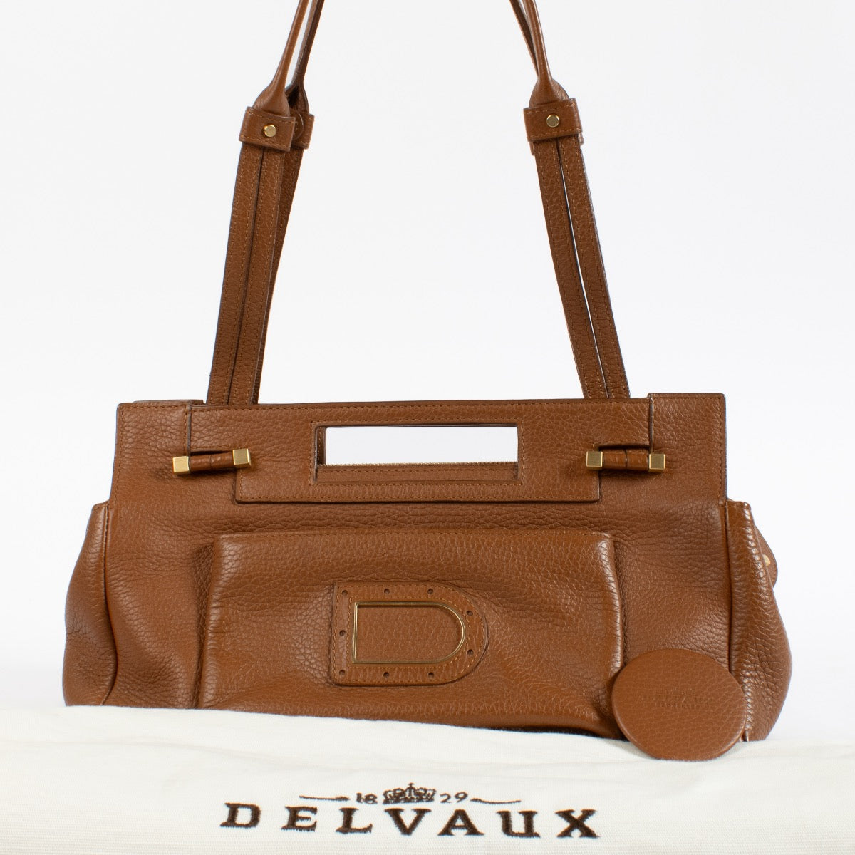 Shop 100% authentic second hand Delvaux Camel Benjamin PM Top Handle Bag on Labellov.com