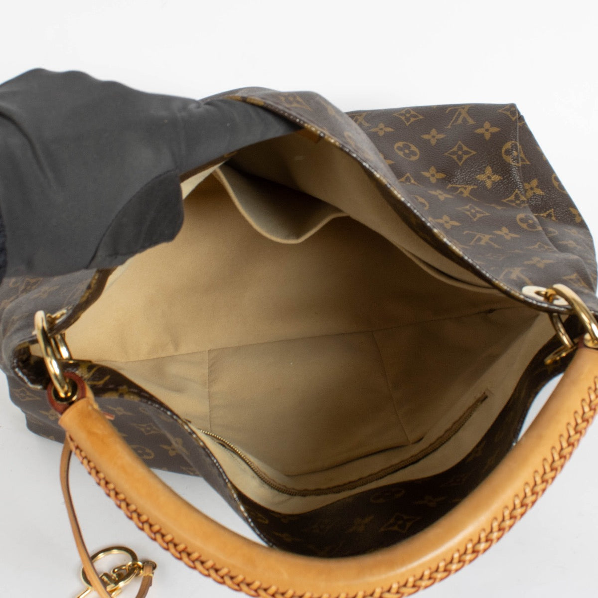Authentic pre-loved Louis Vuitton Monogram Artsy MM on Labellov.com