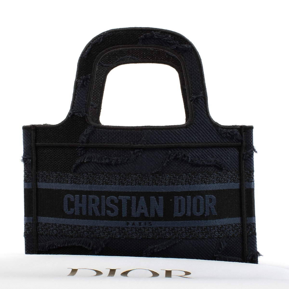 Shop safe online at Labellov in Antwerp, Brussels and Knokke this 100% authentic second hand Christian Dior Navy Blue Mini Book Tote Bag