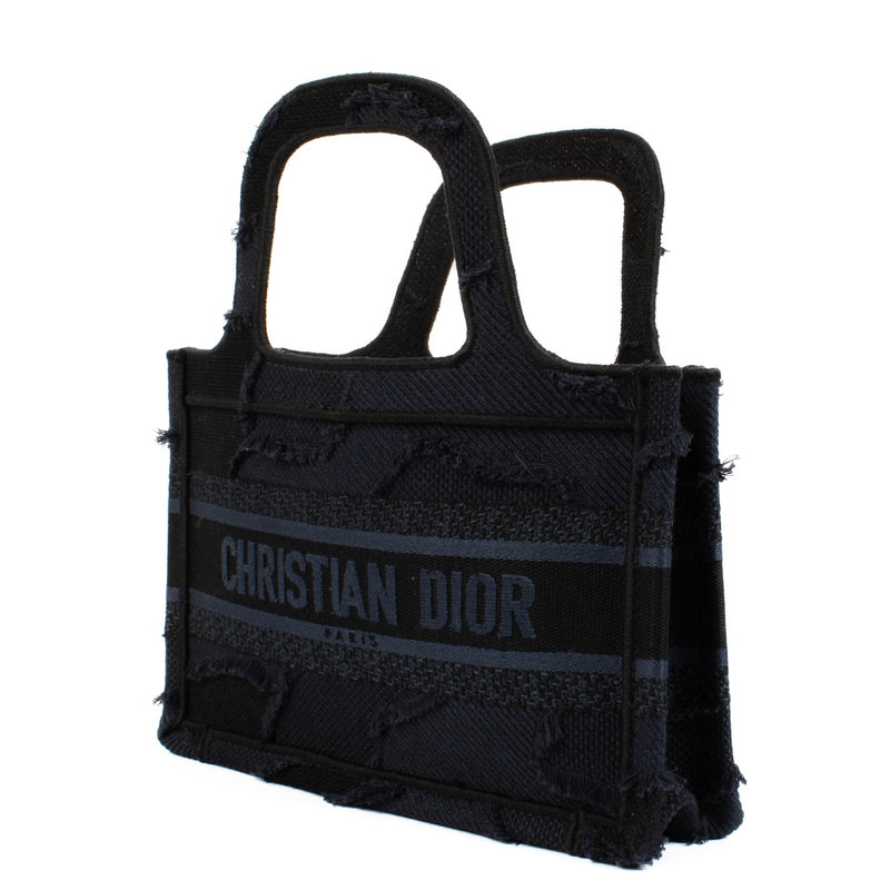 Shop safe online at Labellov in Antwerp, Brussels and Knokke this 100% authentic second hand Christian Dior Navy Blue Mini Book Tote Bag