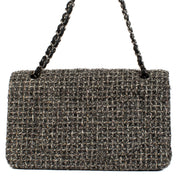 Shop safe online at Labellov in Antwerp, Brussels and Knokke this 100% authentic second hand Chanel Tinsel Tweed Classic Flap Bag