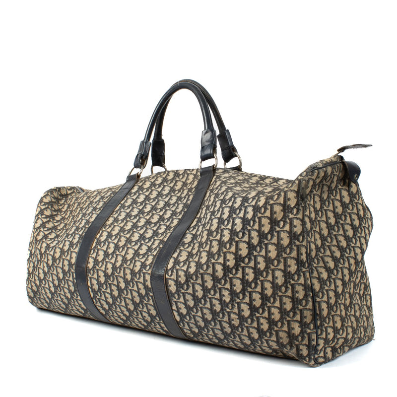 Shop 100% authentic Christian Dior Blue Oblique Canvas Travel Bag at Labellov.com.