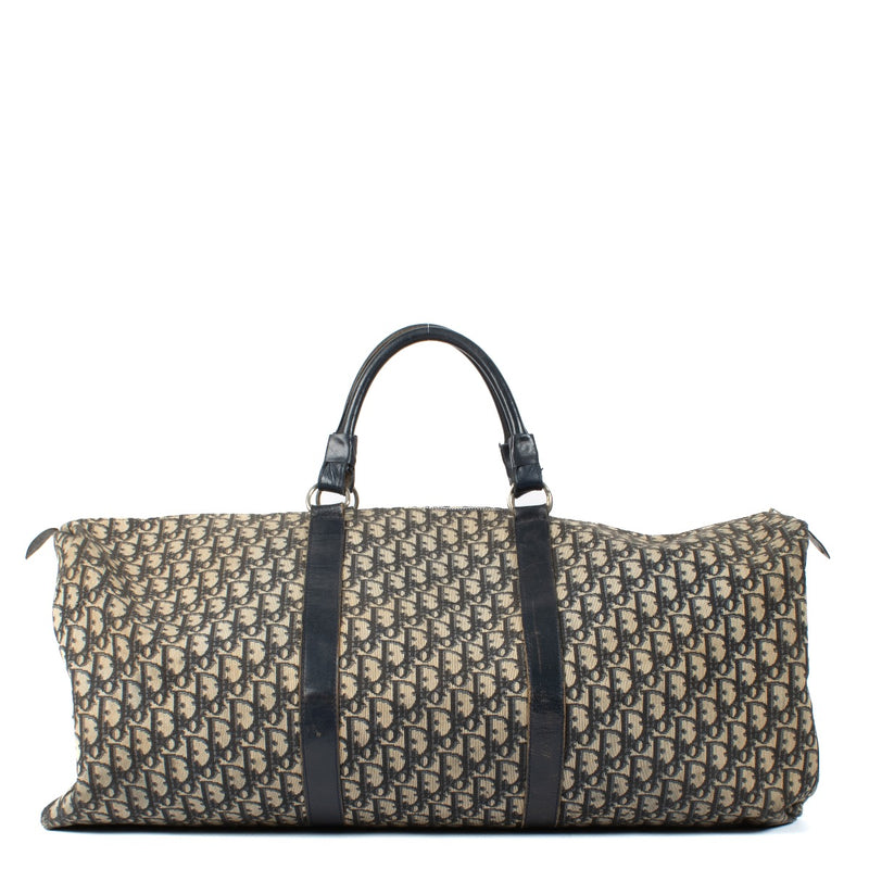 Shop 100% authentic Christian Dior Blue Oblique Canvas Travel Bag at Labellov.com.
