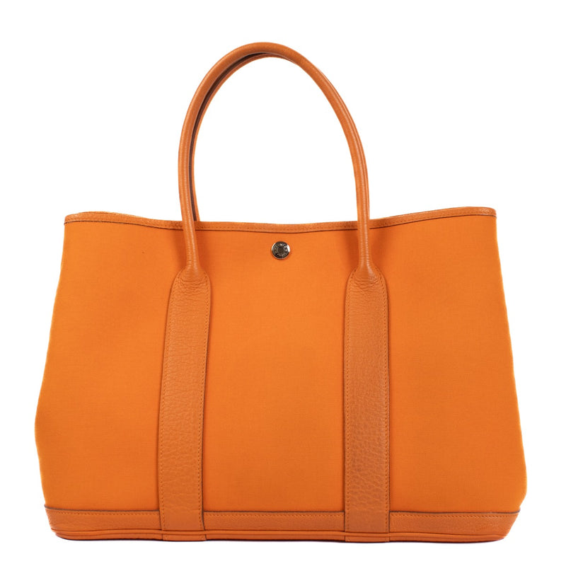 Authentic second hand Hermès Garden Party 36 Orange Toile Officier/Buffalo PHW on www.labellov.com