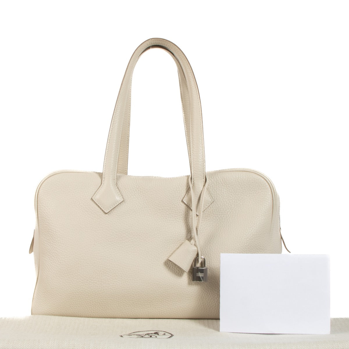 Shop authentic second hand Hermès Victoria 35 Craie Taurillon Clemence Palladium Hardware on Labellov.com