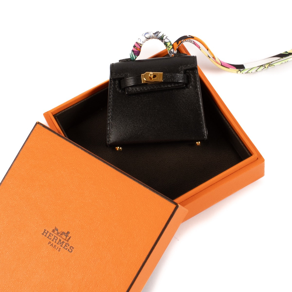 shop 100% authentic second hand Hermès Micro Kelly Twilly Charm Black Tadelakt GHW on Labellov.com