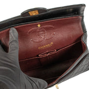 Shop safe online at Labellov in Antwerp, Brussels and Knokke this 100% authentic second hand Chanel Black Lambskin Vintage Small Classic Flap Bag