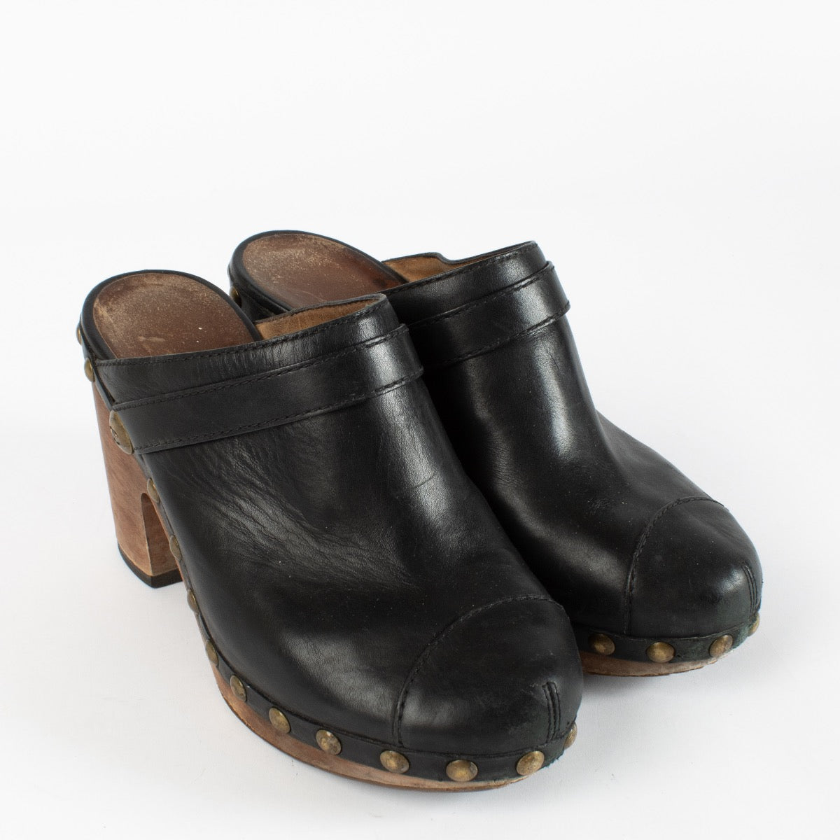 shop 100% authentic second hand Chanel 2010 Black CC Logo Studded Leather Platform Clogs - Size 38 1/2 on Labellov.com