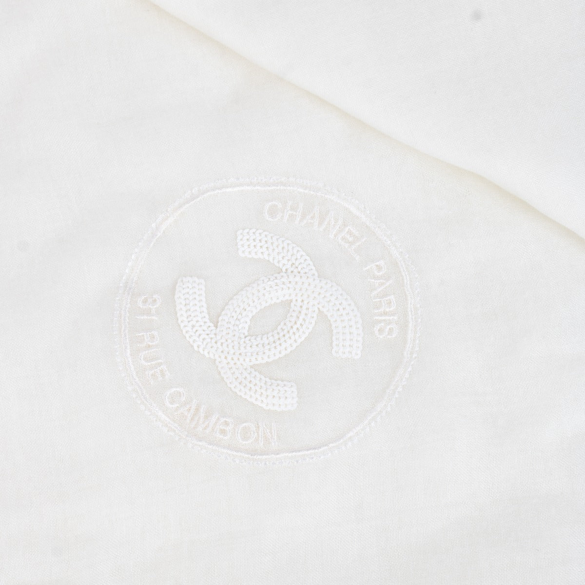 Shop safe online at Labellov in Antwerp, Brussels and Knokke this 100% authentic second hand Chanel White Sheer Modal / Cashmere Blend CC Shawl