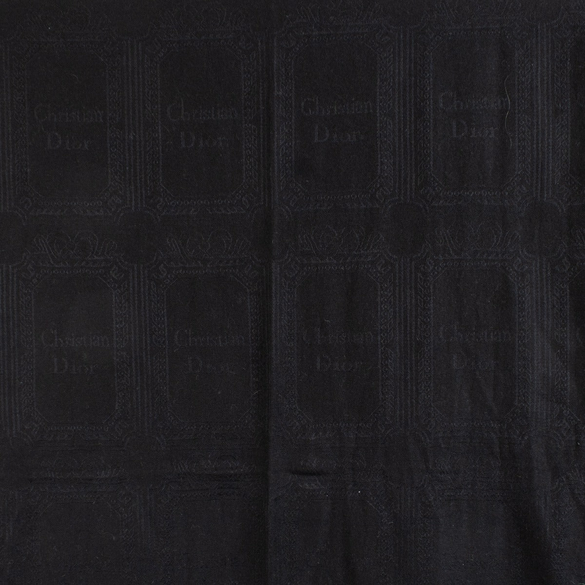 Shop safe online at Labellov in Antwerp, Brussels and Knokke this 100% authentic second hand Christian Dior Black Cashmere Logo Jacquard Shawl