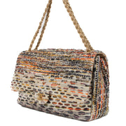 Shop safe online at Labellov in Antwerp, Brussels and Knokke this 100% authentic second hand Chanel Multicolor Tweed Quilted Coco Cuba XL Flap Bag