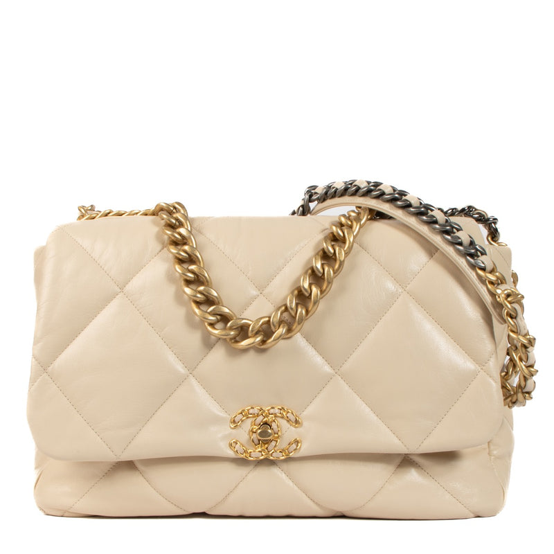 Shop safe online at Labellov In Antwerp, Brussels and Knokke this 100% authentic second hand Chanel Beige Lambskin Leather Maxi 19 Bag