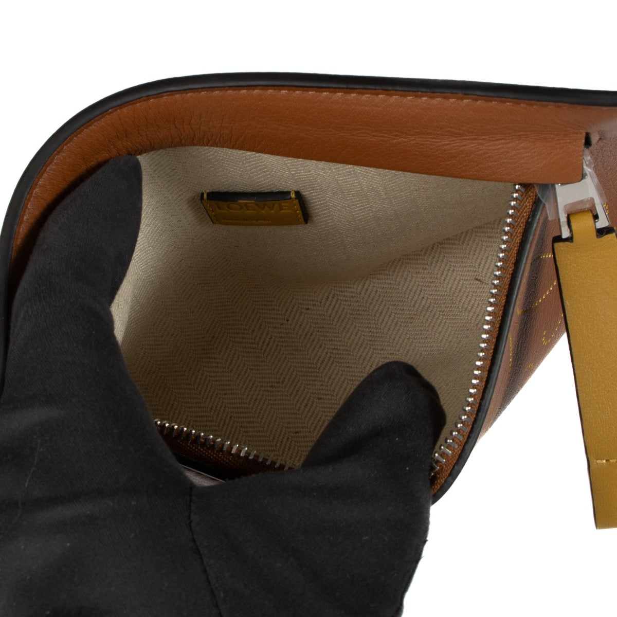 Shop 100% authentic secondhand Loewe Brown Anagram Clutch Bag on Labellov.com