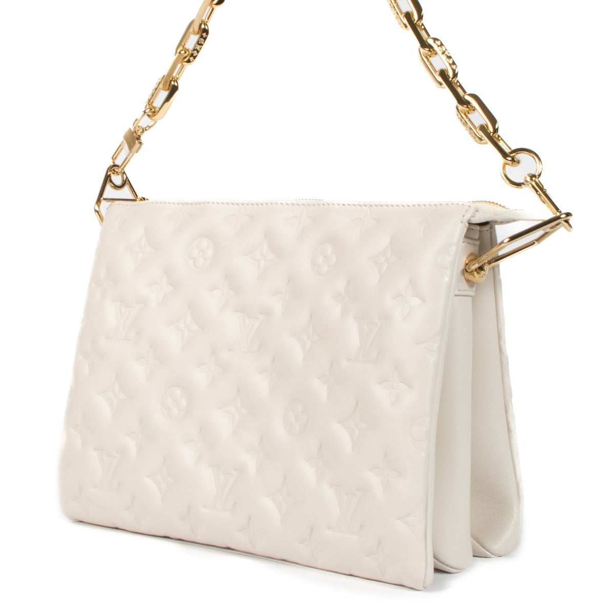 Shop safe online at Labellov in Antwerp, Brussels and Knokke this 100% authentic Louis Vuitton Creme Leather Coussin PM Bag
