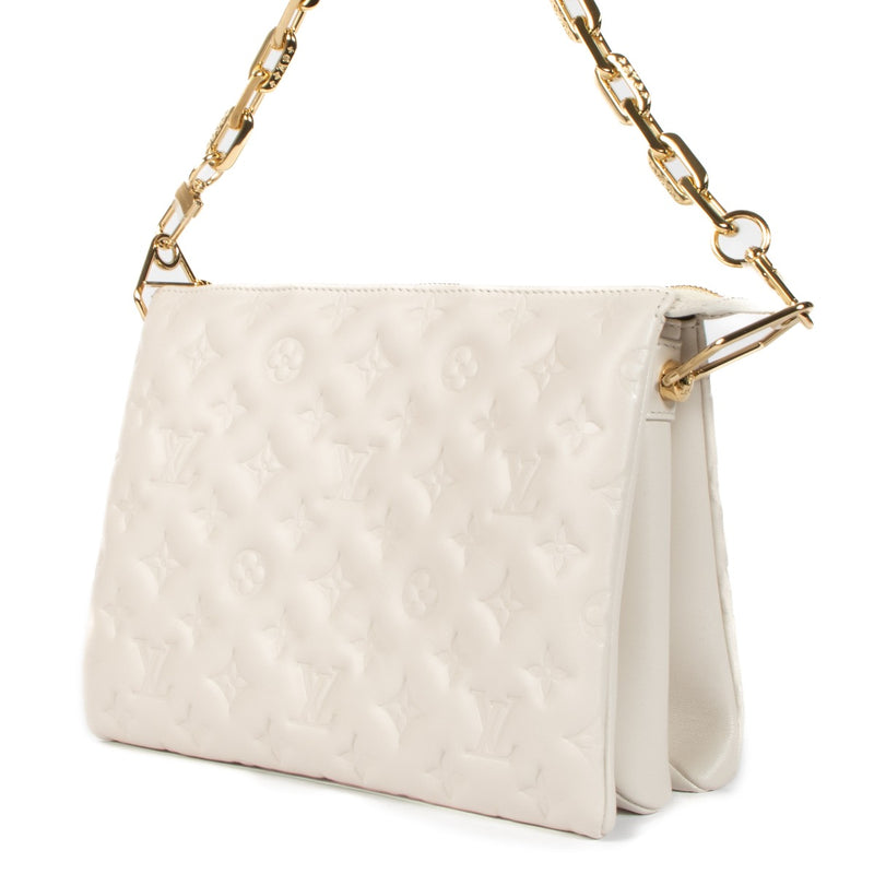 Shop safe online at Labellov in Antwerp, Brussels and Knokke this 100% authentic Louis Vuitton Creme Leather Coussin PM Bag