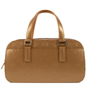 Shop safe online at Labellov in Antwerp, Brussels and Knokke this 100% authentic second hand Louis Vuitton Gold Vernis Mat Shelton Top Handle Bag