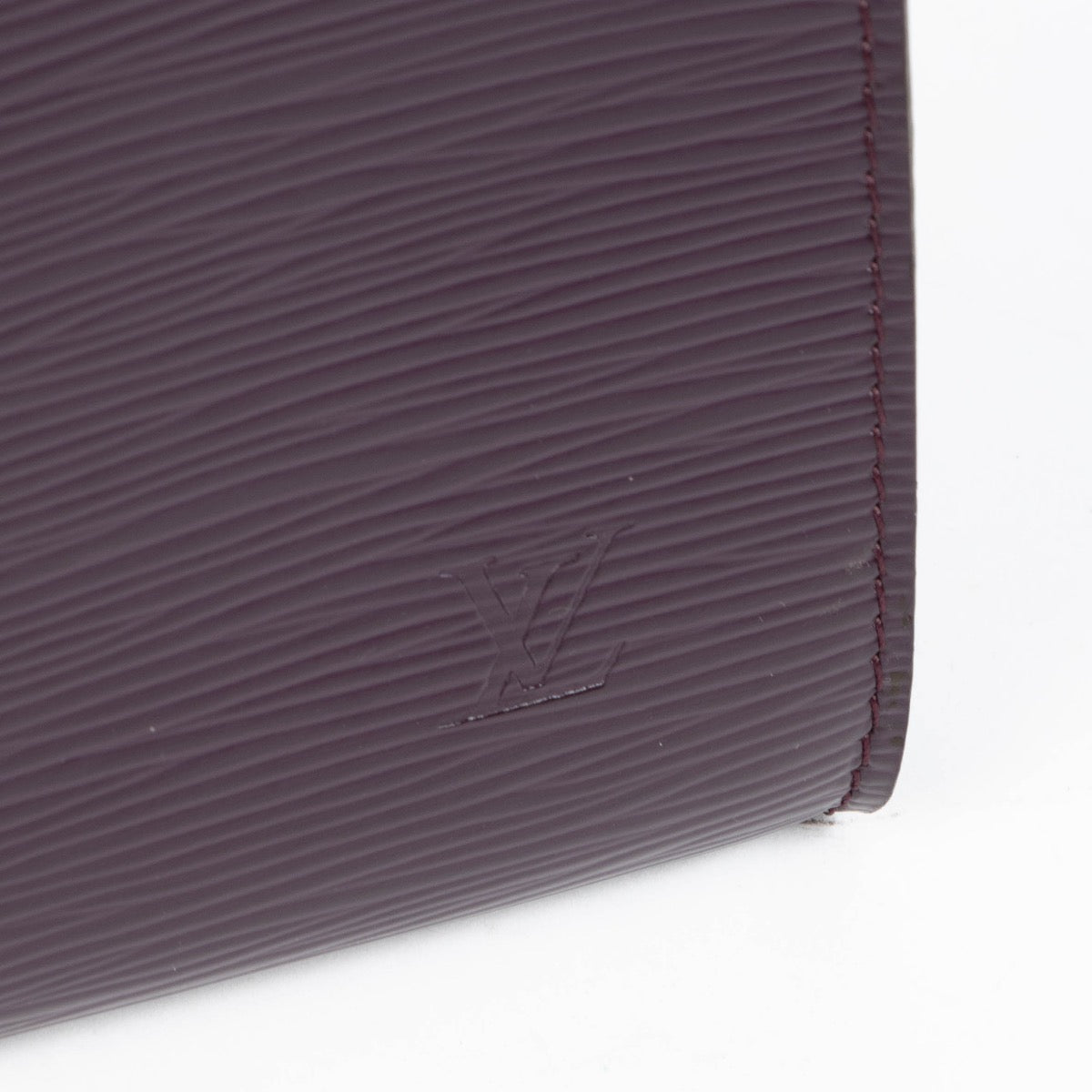 Authentic pre-loved Louis Vuitton Cassis Epi Pochette Accessoire Clutch on Labellov.com